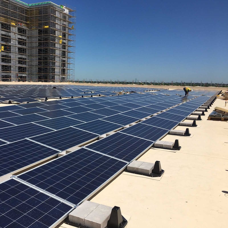 Solar panels on the roof a building under construction