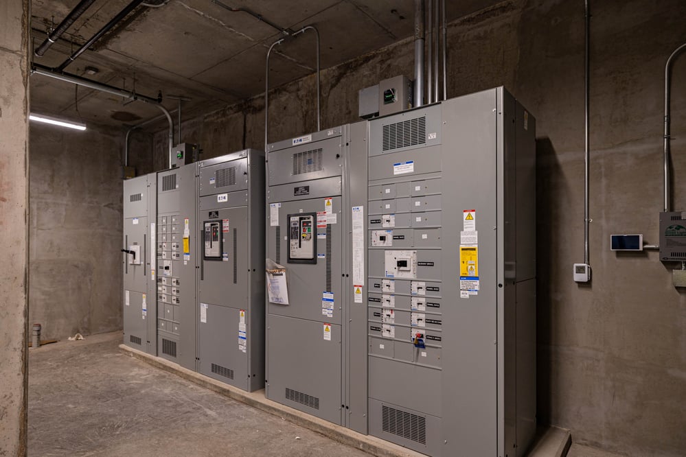 view of a few panels in a concrete-walled room