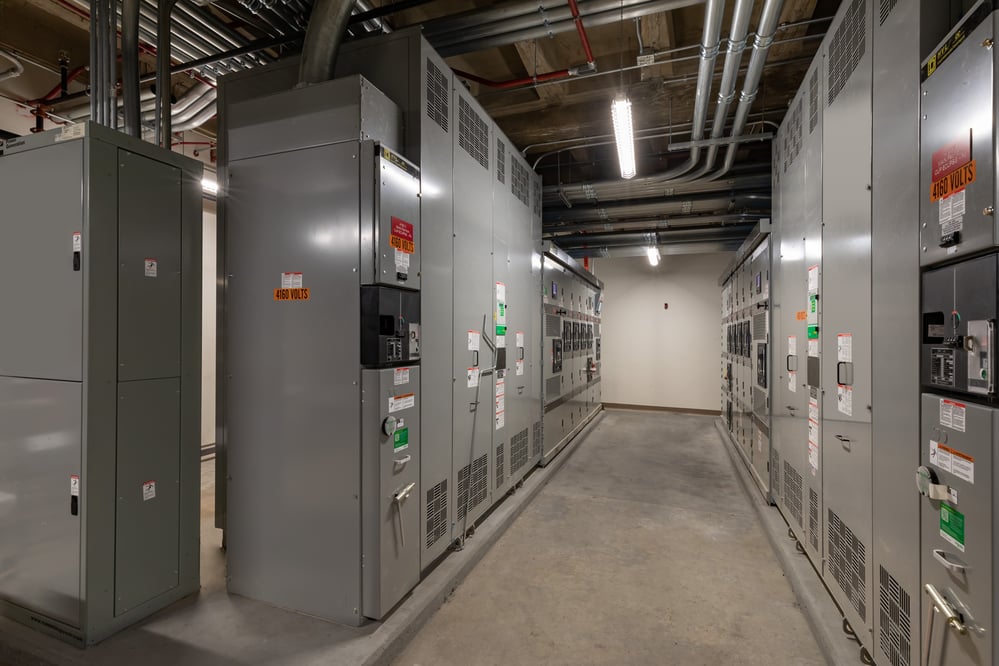 Room with rows of electrical panels