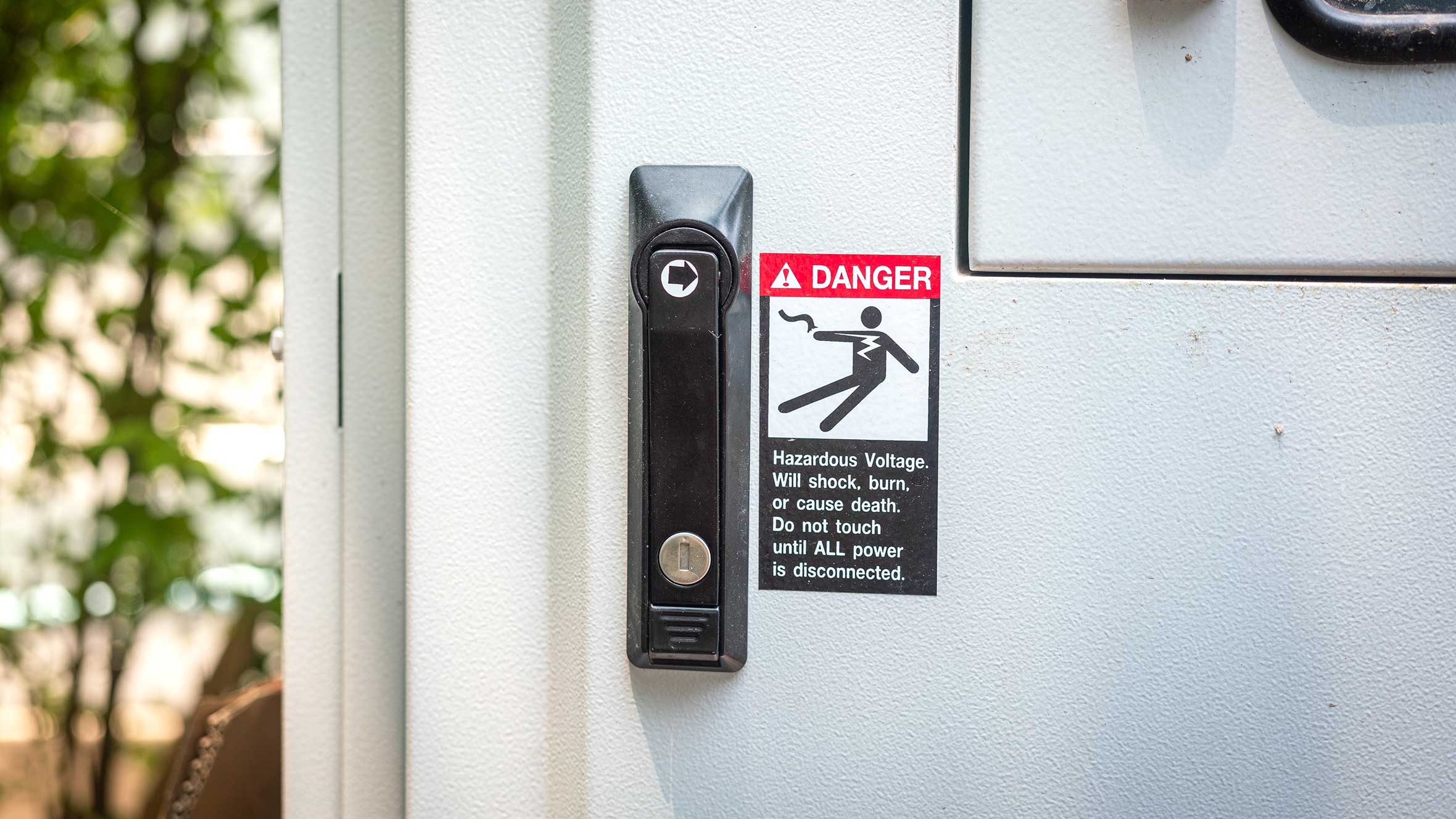 Close-up-of-a-panel-with-an-arc-flash-hazard-label-2360x1328