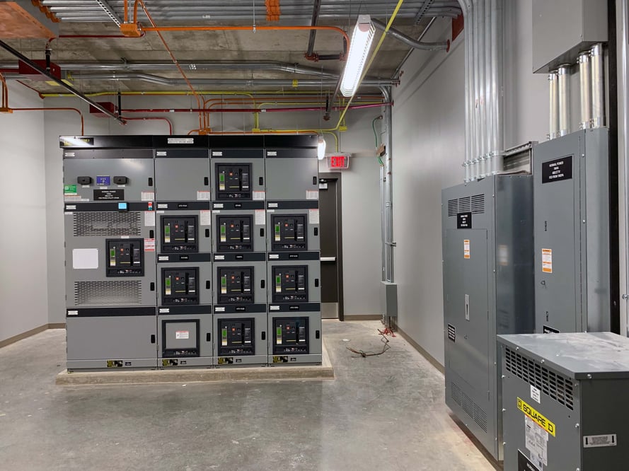 room with electrical panels and control systems