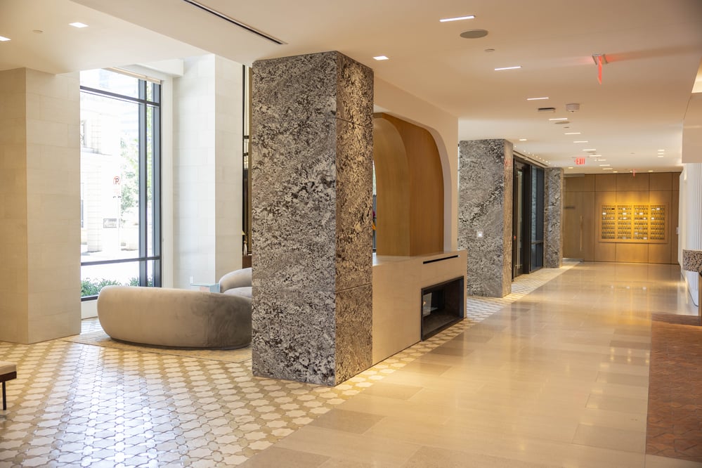 Interior of a Contemporary building with marble pillars and tiled flooring