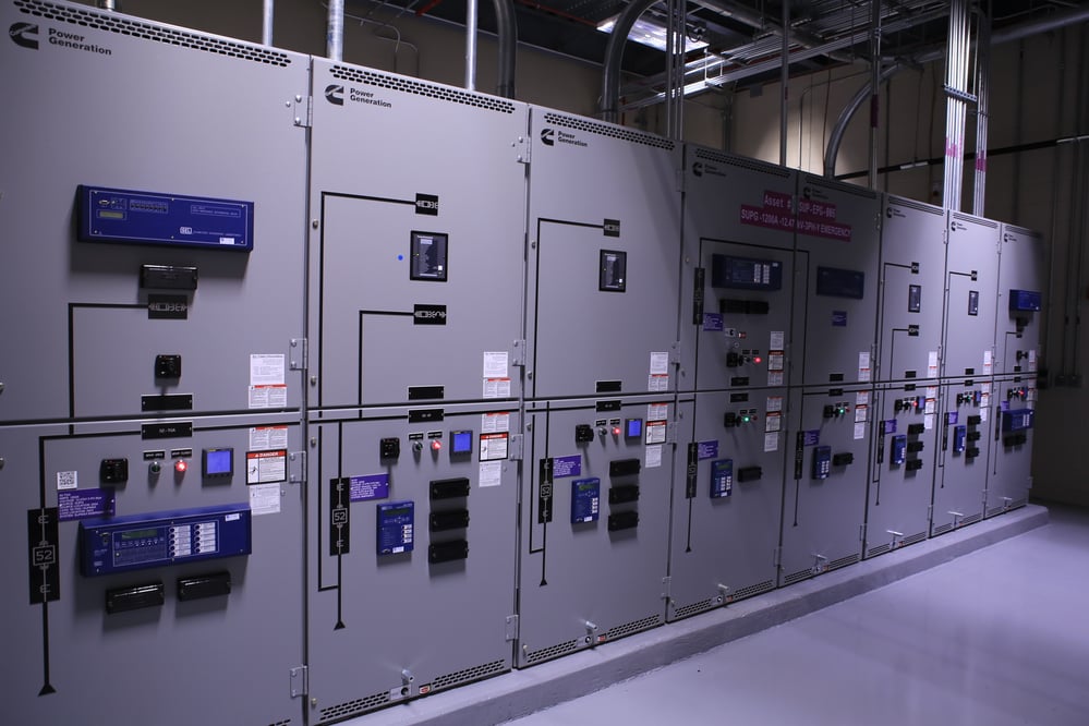 Rows of electrical control panels and equipment