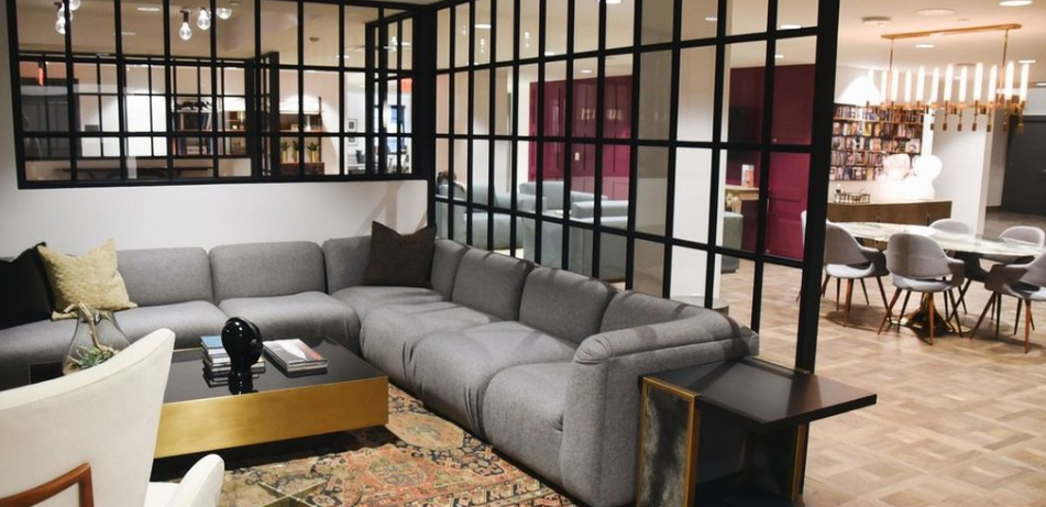 Contemporary social space with couches and public tables