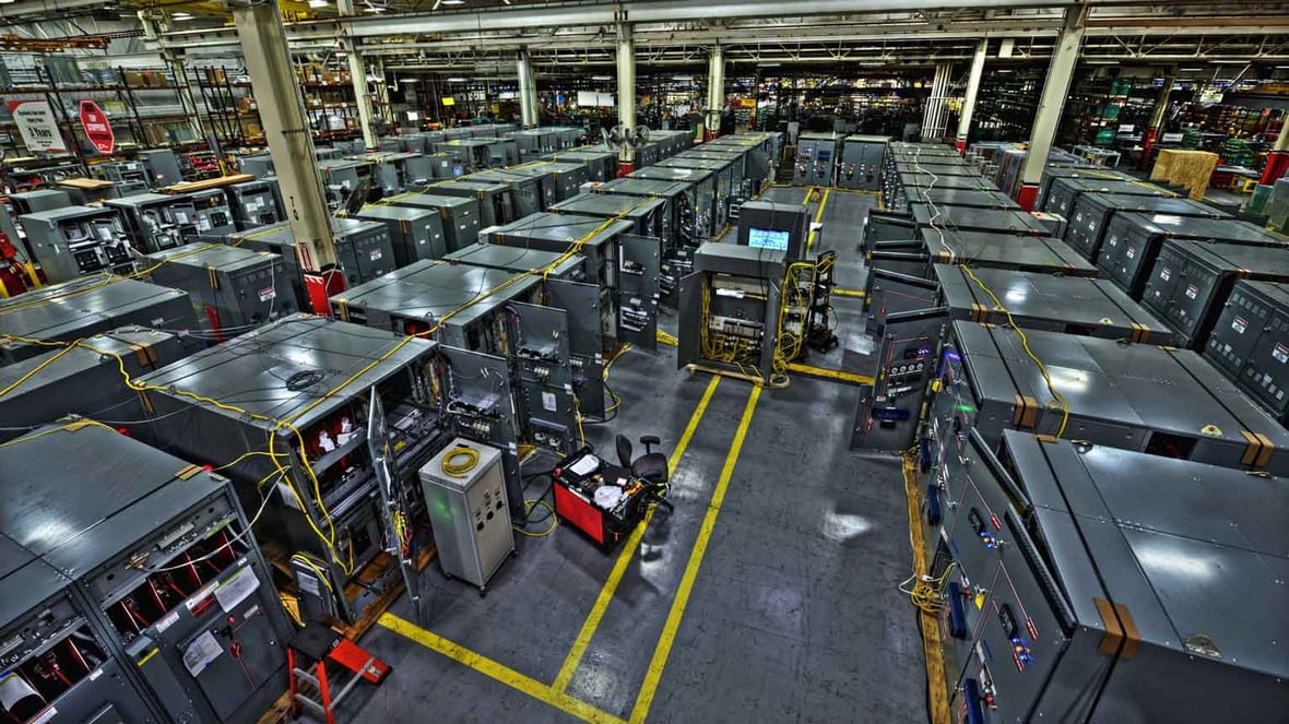 indoor overhead view of parallel electrical switchgear