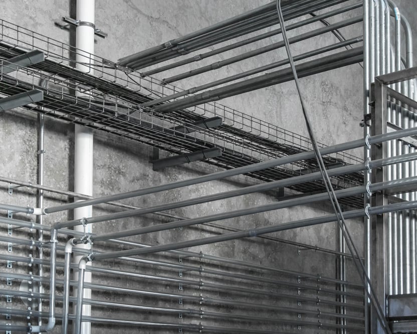 Clean view of conduit with cabling racks overtop
