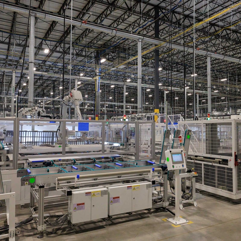interior view of robotic arms and manufacturing machines