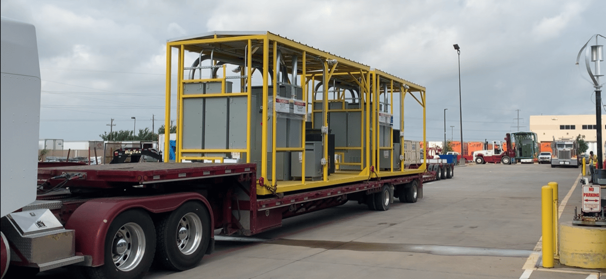 A couple of prefabricated skids loaded on a truck for transportation and delivery